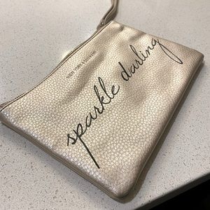 “Sparkle Darling” pink/champagne zipper clutch. Only used twice! Great condition